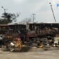 Kondisi bangkai bus Transjakarta masih terlihat di Terminal Rawa Buaya, Cengkareng, Jakarta Barat, usai peristiwa kebakaran. Foto dok. plus62.co/rdw
