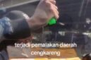 Foto tangkapan layar tiktok aksi pemalakan sopir Travel di Jalan Ringroad kayu besar Cengkareng Jakarta Barat 