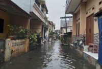 Ratusan rumah warga di RT 18 RW 12, Kelurahan Kapuk, Kecamatan Cengkareng, Jakarta Barat, terendam banjir